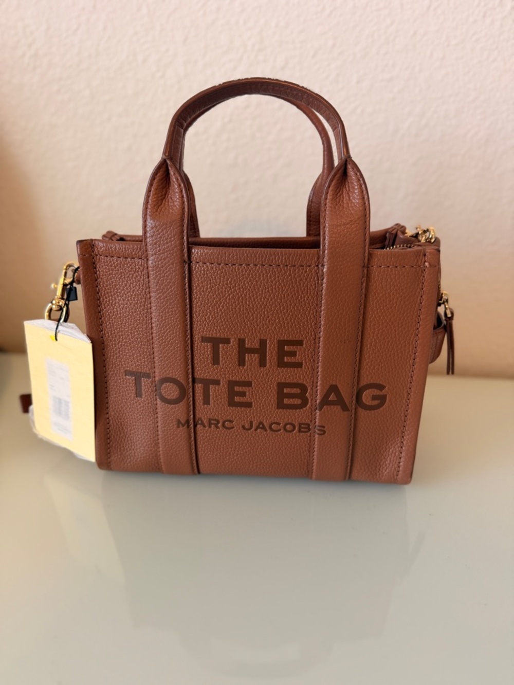 Marc Jacob’s The Tote Bag Argan Oil Leather Mini Tote Bag - Brown